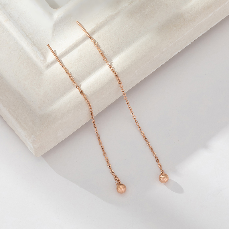 Net red titanium steel pullable earrings female rose gold temperament long version fashion simple retro small gold bean tassel earrings