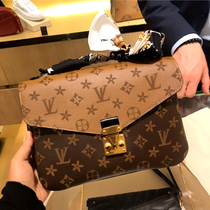 Hong Kong counter big name messenger bag 2021 New Tide printing leather versatile color color lock bag