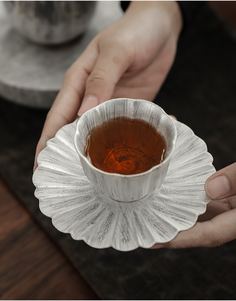 By mud coppering. As cup mat Japanese household manual brush silver cup holder, ceramic hot insulation pad kung fu tea accessories