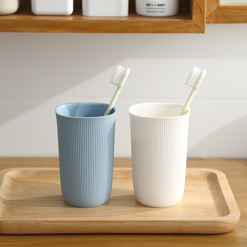 Creative toilet cup for home toothbrushing cup with a pair of matching plastic set toothbrush cup