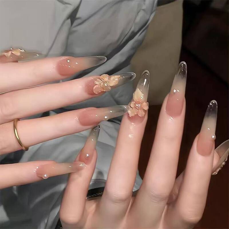 Popular Cool and Elegant 3D Lily Ice Flower Nail Art, Long Style with a High-End Feel, Simple Nude Color Gradient, Wearable Fake Nails That Enhance Complexion Popular Cool and Elegant 3D Lily Ice Flower Nail Art, Long Style with a High-End Feel, Simple Nude Color Gradient, Wearable Fake Nails That Enhance Complexion