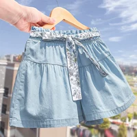 Quần short denim nữ mùa hè phong cách mới trẻ em phiên bản Hàn Quốc của váy đa năng một nửa váy ngắn quần ngắn quần short nóng - Quần jean quần lót trẻ em