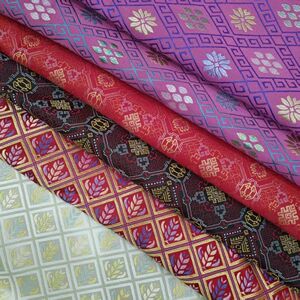 Guangxi Intangible Cultural Heritage Zhuang Brocade Fabric with Colorful Patterns and Jacquard Fabric with Gold and Jade