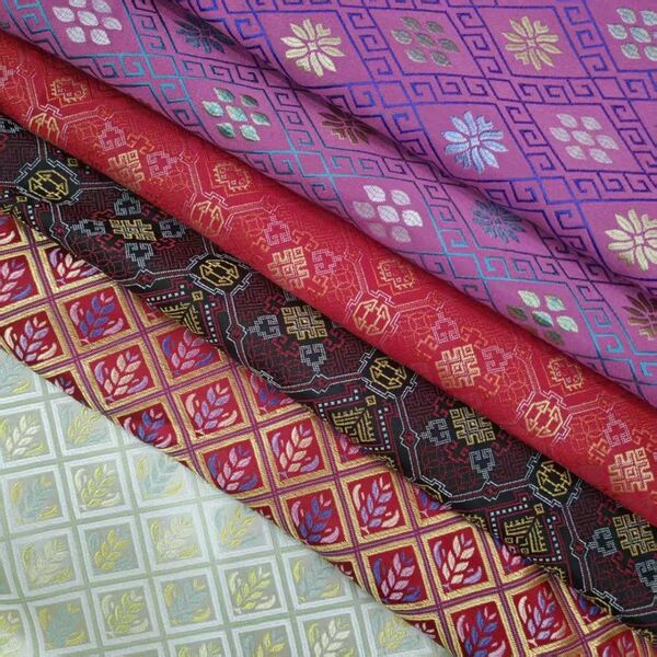 Guangxi Intangible Cultural Heritage Zhuang Brocade Fabric with Colorful Patterns and Jacquard Fabric with Gold and Jade Motifs for DIY Traditional Fabrics Guangxi