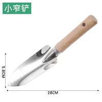 Деревянная ручка яркая поверхность узкая лопата