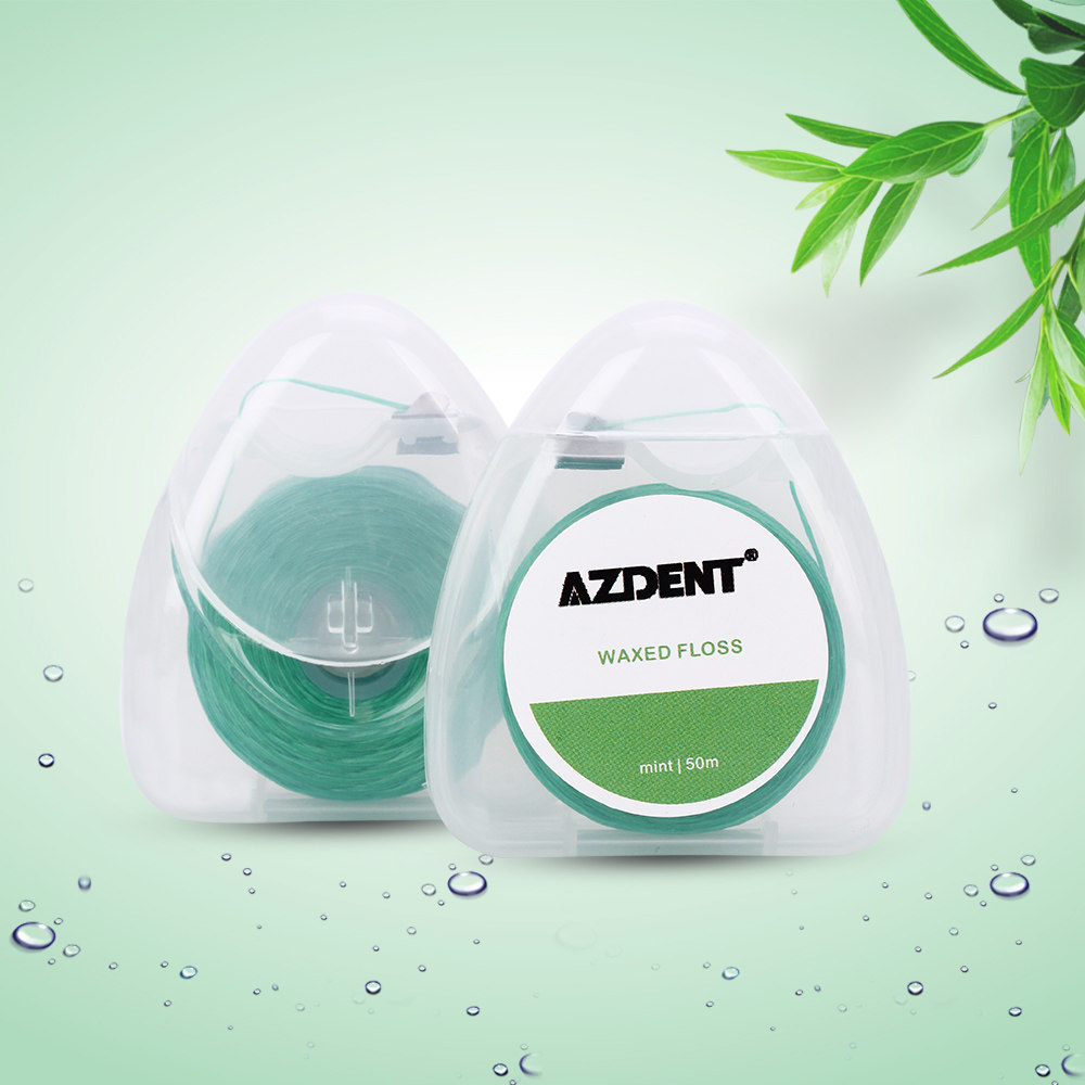 TackOre exports European mint flavor waxed PP thread 750D triangle transparent box green dental floss 50m box