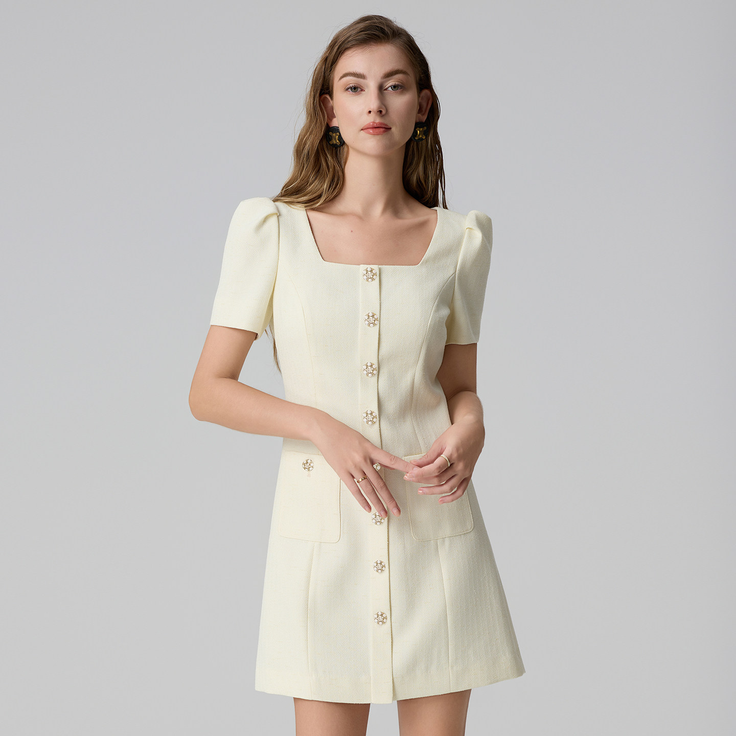 A small, elegant, elegant, white dress, a 2026 summer dress.