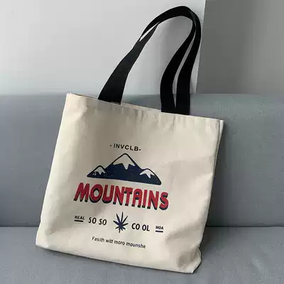 Korean version of lazy wind hand shoulder bag environmental protection shopping bag Japanese simple art student large capacity canvas bag