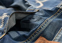 Foreign trade factory exports single tail single goods big brand cut mens washing water embroidery hole elastic slim jeans