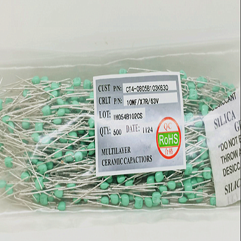 The marble capacitor 104 154 224 334 474 684 long foot green paint 63V0 1uf foot distance 5 08mm