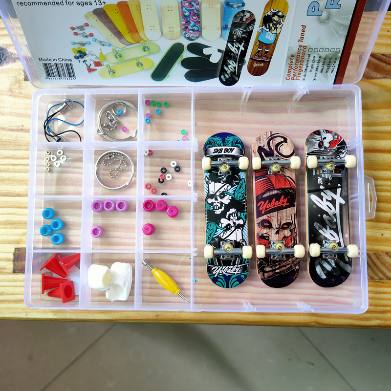 Three-pack plastic finger skateboard set four-wheel double rocker mini fingertip children and teenagers toys with accessories