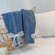 Girl micro horn pants little girl jeans sweet and beautiful butterfly knot net red spring cash 100 lap light blue long pants