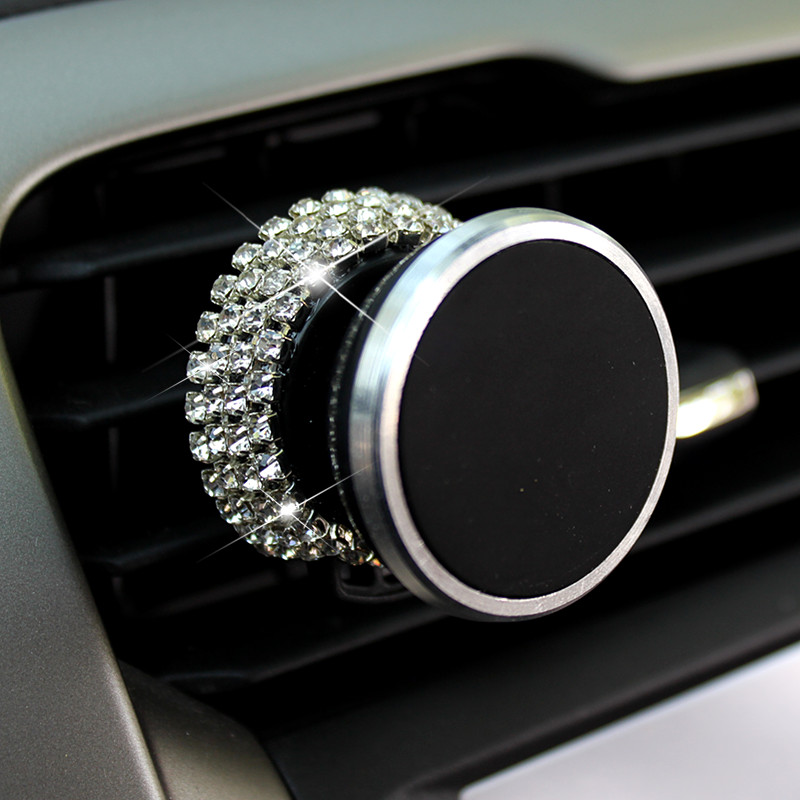 Car mobile phone bracket Car air outlet magnet mobile phone seat satellite navigation multi-function universal version bracket supplies