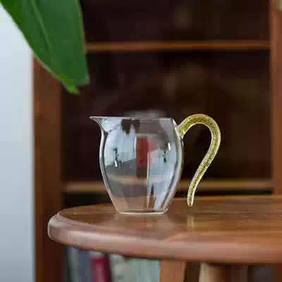 In the bag, the glass male Cup, the tea leak set, the side, the tea divider, the High Borosilicate Glass, the tea cup, the large uniform Cup