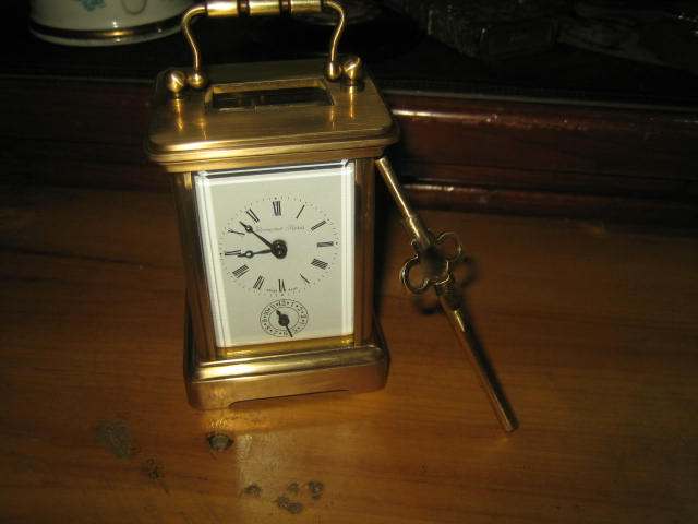 Swiss small horse-drawn carriage clocks in alarm bells (antique table collection)