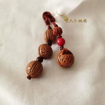 Wild mountain peach core to ward off evil spirits Car key pendant to keep safe Peach wood cinnabar beads anti-villain wear a long time can be wrapped pulp