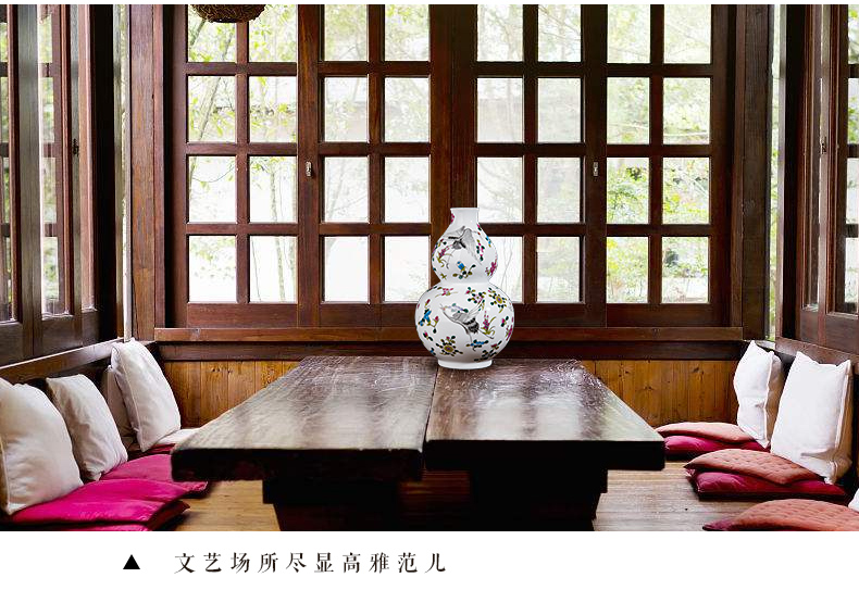 Jingdezhen ceramics northern wind creative process wine colored enamel luminous floret bottle household adornment furnishing articles