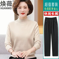 Бежевые черные штаны