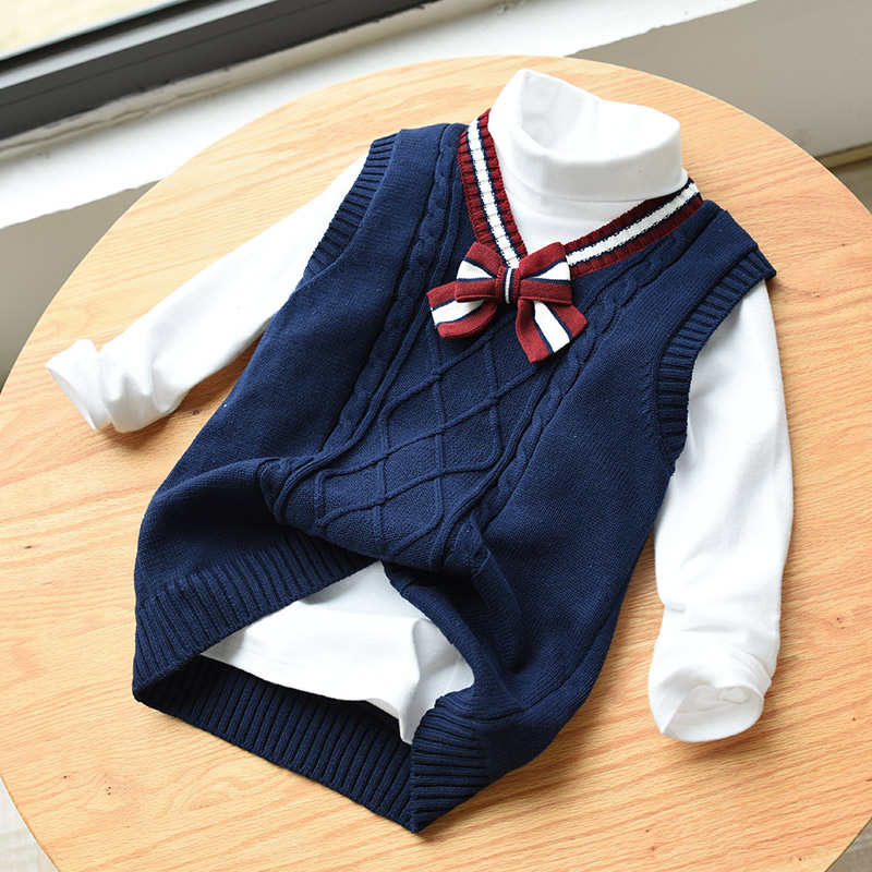 Đại học gió trẻ em áo len cotton cô gái đan vest bướm nơ lớn quần áo trẻ em 10 tuổi