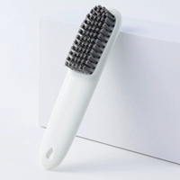 Белая щетка для обуви