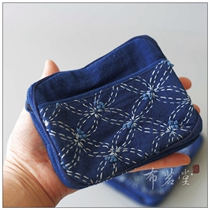 Bumingtang Thorn embroidery essential oil bag cosmetic bag grass blue dyeing process hand embroidery