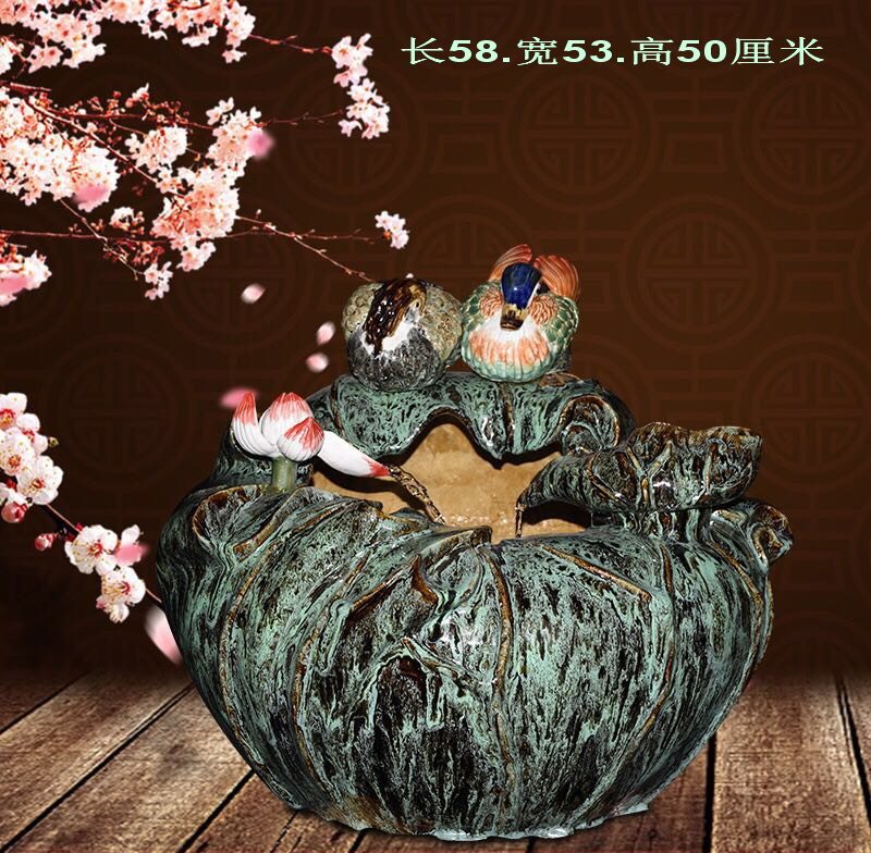 Ceramic fountain flow water and migrating art of the wedding gift of the festival gold fish tank indoor humidifier fountain