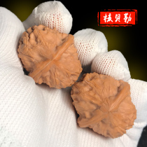 (Pinggu Jujube)Fine small hand twist text play walnut rock lion head hand piece natural health ball gift