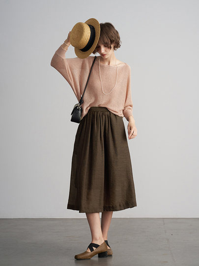 Anna Is a Social Media Sensation, and Her Gold and Silver Thread Linen Batwing Sleeve Off-Shoulder Knit Top Is an Elegant Three-Quarter Sleeve Blouse