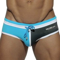 Đồ bơi nam tam giác mới Colorblock eo thấp Đồ bơi nam hợp thời trang Quần bơi nam quần bơi nam hàng hiệu