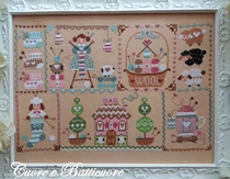 Cuore E Batticuore comes with DMC Cross Stitch Weaver Girl