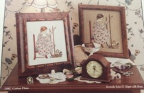 Magazine figure with DMC cross stitch Flossie