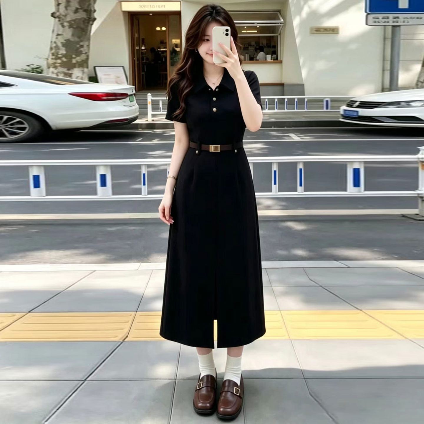 This large-sized black French Hepburn style dress is a high-end and elegant long dress for a chubby girl in summer with a tie, a cinched waist and a slit