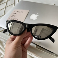 Кошачий глаз черный рамка серебряный стол