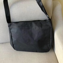 logo for a single shoulder inclined satchel bag