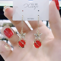 The sentiment of the sentiment of the famous flower red cat eye ball ear decoration in 2022 new trend fashion and ear crash