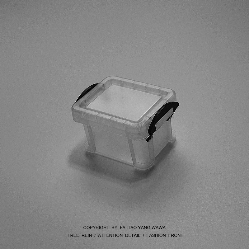 Clockwork boredom with a miniature containing box to pack up something to play mini-containing box