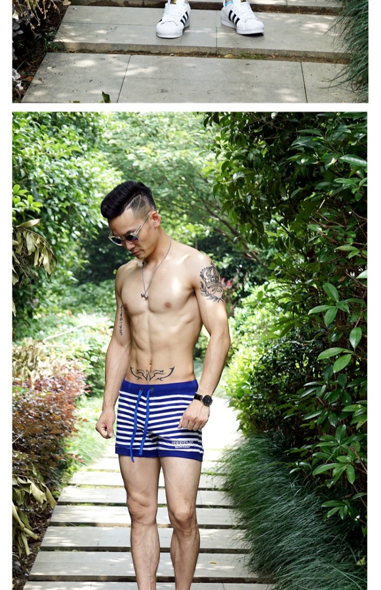 Quần short thể thao nam mùa hè cotton sọc ba quần quần đi biển 3 điểm Qi J quần nhà thể dục quần thủy triều quan dui nam