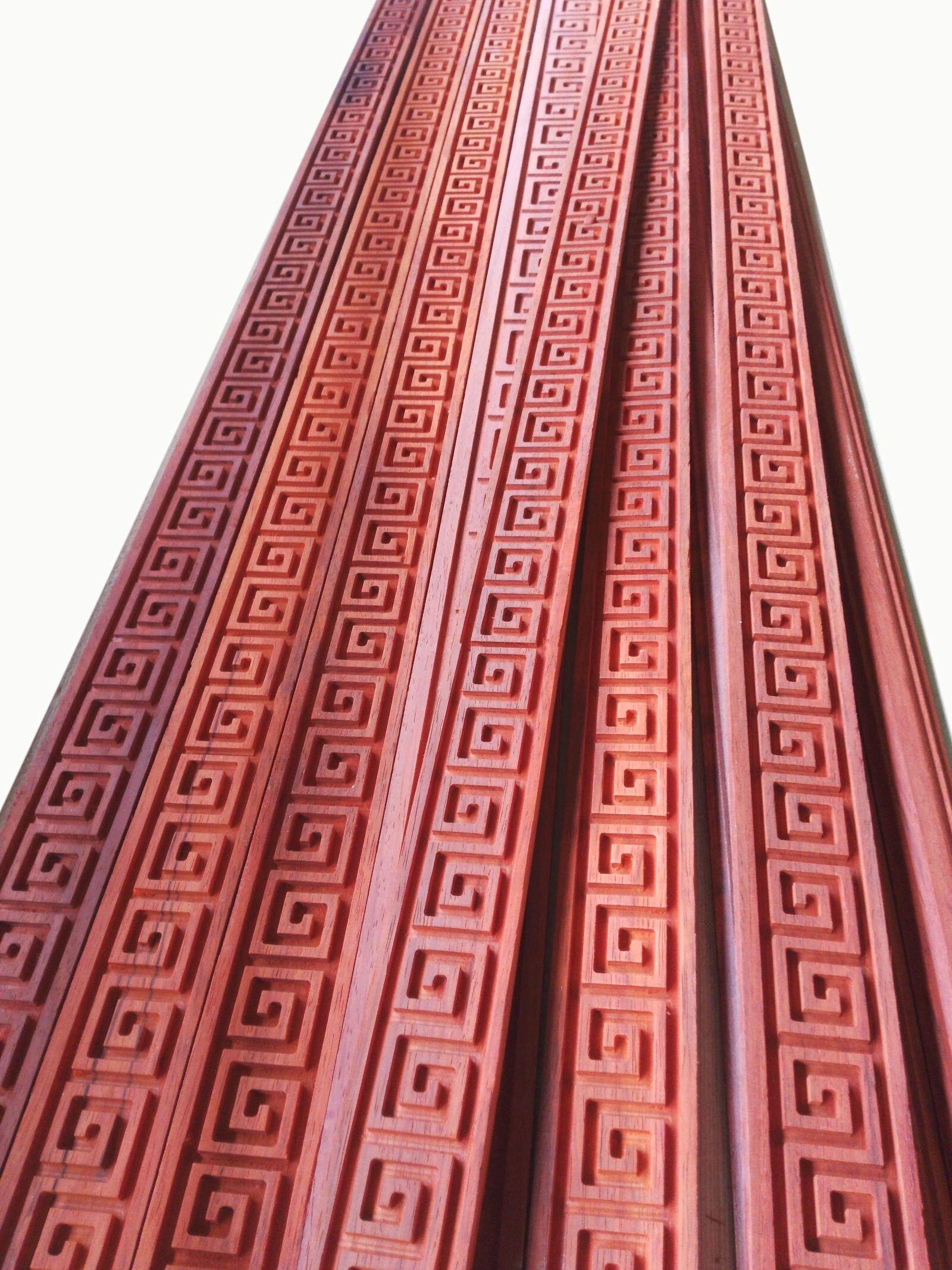 Manufacturer direct sales customized Dongyang wood carving African red flower pear solid wood decoration back grain Great Wall Carved Wood Line Corner Flowers