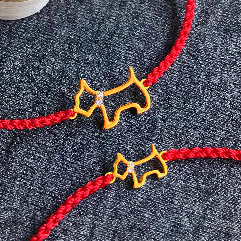 The original year of the young dog 18K gold inlaid with natural diamonds mini dog hand-woven red rope