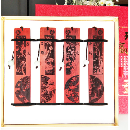 Creative Chinese style sandalwood bookmark four-in-one exquisite hollow plum orchid bamboo chrysanthemum spring, summer, autumn and winter support customization