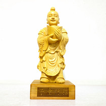 Wood carving of a boy who attracts wealth and worships the god at home. Handmade boxwood carving of the God of Wealth golden boy and jade girl exquisitely carved ornaments.