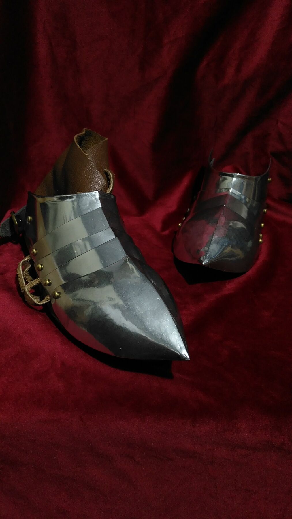 Full-size shoes A Medieval plate A of the Middle Ages