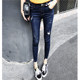 Spring dark blue trousers with raw edges, ripped 9-point tight skinny jeans