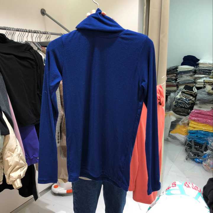 QNI Hàn Quốc mua áo nữ mùa thu 2018 mới áo thun cổ cao Dongdaemun 110110 áo phông trắng nữ