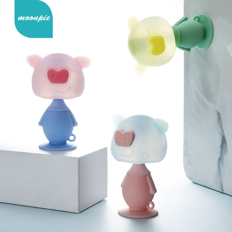 Food grade silicone cute pig rattle baby anti-eating hand silicone teether can be boiled toy to relieve tooth itching