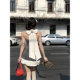 Dust Deng Deng ອອກແບບ sexy ແມ່ຍິງຮ້ອນຊຸດແມ່ຍິງ 2024 summer ຮູບແບບໃຫມ່ halter neck top short skirt ສອງສິ້ນຊຸດ