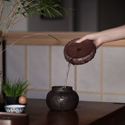 The diameter of the dry-brewing table and pot pad of the Chinese-style Gongfu tea set from the original ore of Huanglongshan in Yixing is 14.8cm