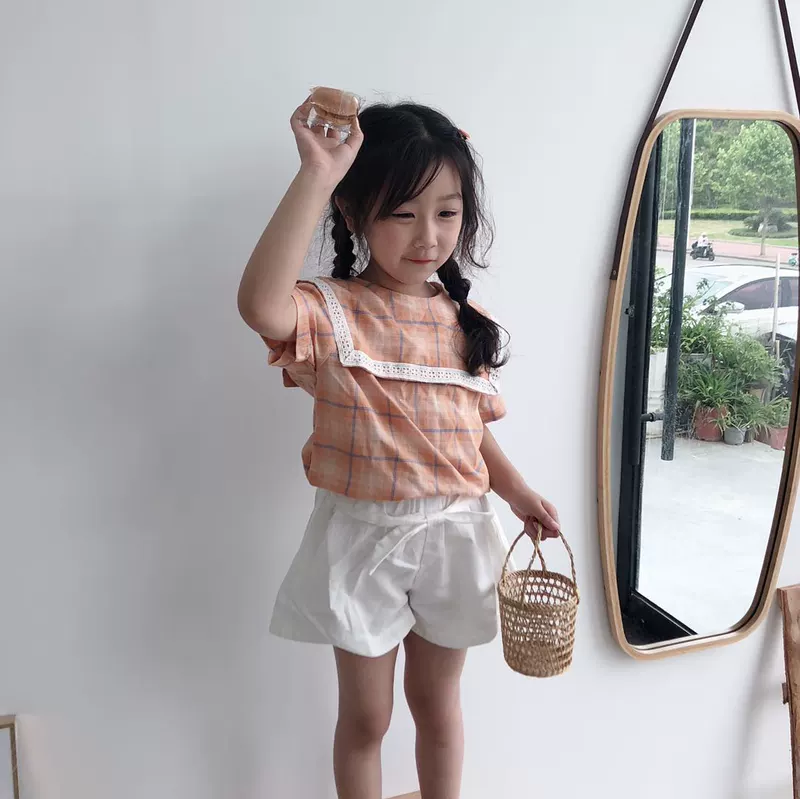 Phiên bản Hàn Quốc của quần áo trẻ em năm 2020 mùa hè mới phong cách retro trẻ em áo sơ mi lớn ve áo cô gái áo sơ mi bông kẻ sọc - Áo sơ mi