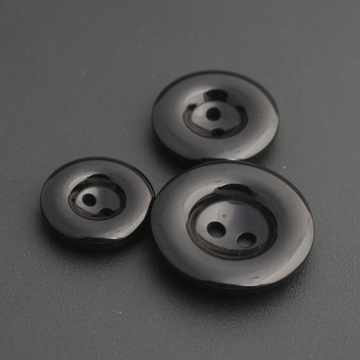 Round rounded edges thickened with two eyes resin black full black coat wind suit upscale bright light button Buttons The