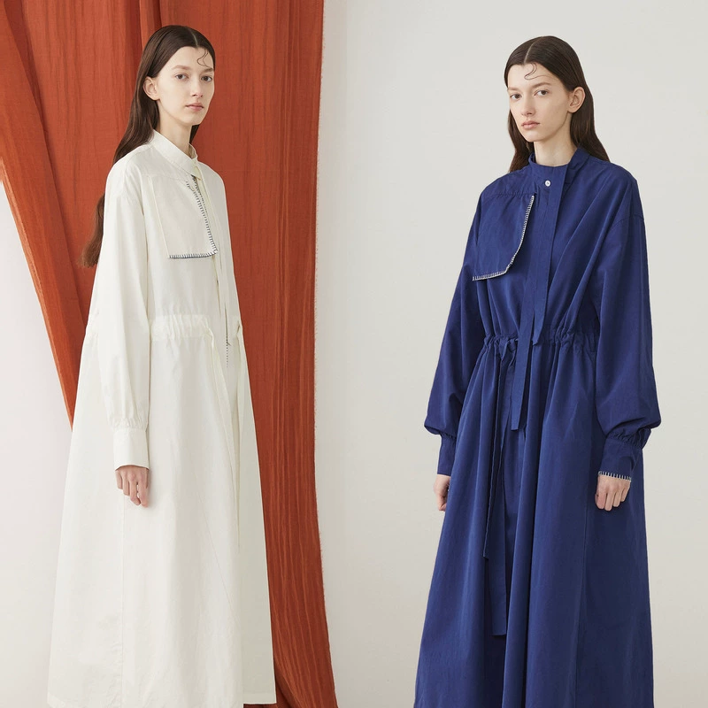 Hình bán nguyệt ban đầu của nhà thiết kế phụ nữ năm 2021 áo gió mùa xuân và mùa thu mới giản dị có chiều dài trung bình trên đầu gối áo khoác văn học lỏng lẻo - Trench Coat